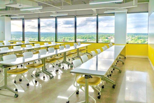 EXPLORE Training Room (17th floor) Seats up to 70 - Dry-erase  desks, dry-erase wall, projector, flexible seating arrangements, city views