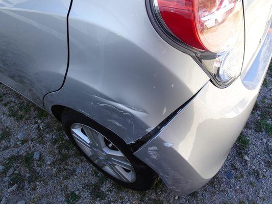 Before repair: dented fender, dislodged bumper, slightly damaged faith in the integrity of other drivers