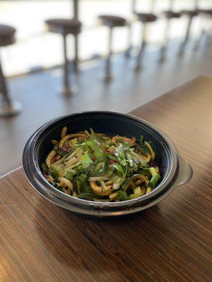 Spicy Korean Zoodle Bowl with whatever that spicy dust is for an extra kick - So good and I think it's vegan.