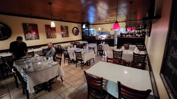 Inside the quiet side of the restaurant without the live music