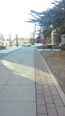 Viewing west on walk path between buildings