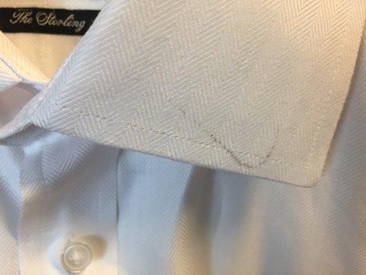 Burn marks on Thomas Pink Business shirt. Shirts never worn before being taken to Pete’s Launderette & Cleaners.