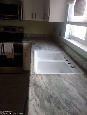 New counter top & backsplash, not as gaudy as most granite.