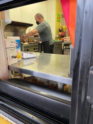 Hot dogs being prepared