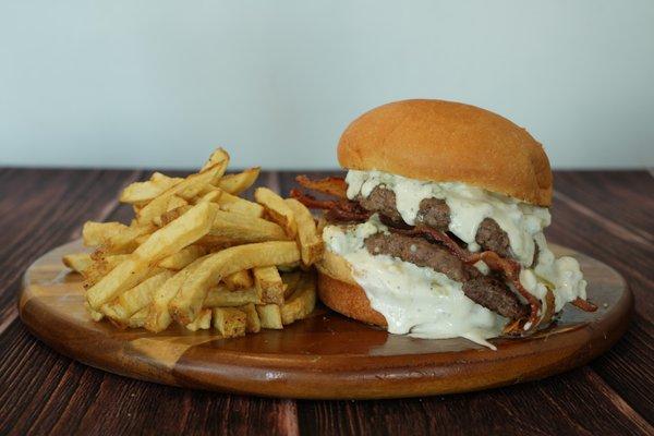 1/2 Pound Ribeye Burger, Blue Cheese Aioli, Blue Cheese Crumble, Smoked Applewood Bacon on a Fresh Baked Bun.