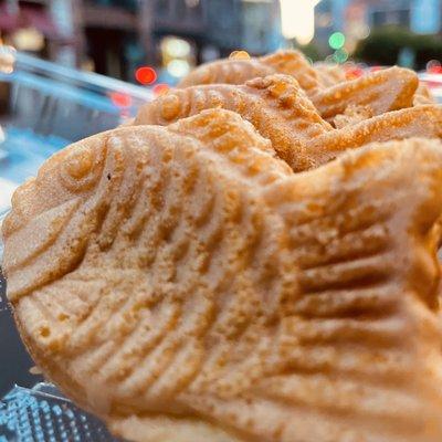 Taiyaki: Fish shaped cake filled with a sweet paste / custard