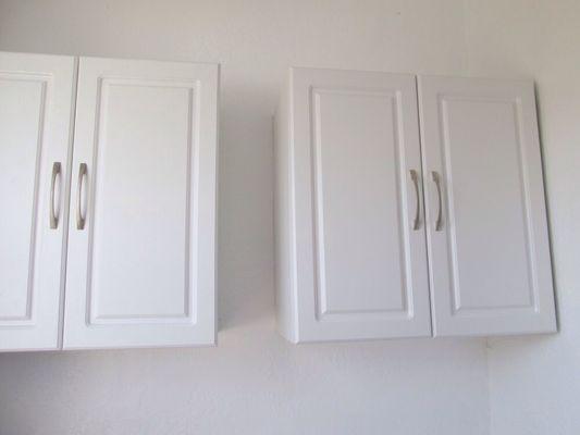 Laundry room cabinets with matching base cabinet