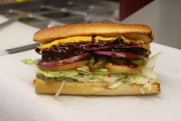 Hot Roast Beef & BBQ Sauce with American Cheese on a Sourdough Hard Roll