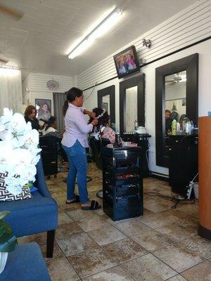 Creating a beautiful wedding updo.