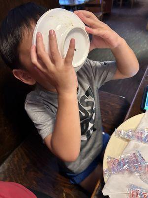 Son demolishing the soup