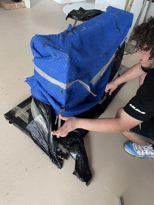 Dining Room Base of Table wrapped with Black Plastic