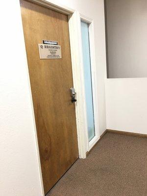 Registry Office door at end of hallway (upstairs)