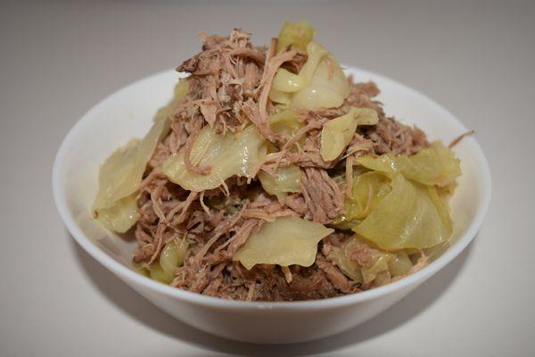 Kalua Pig & Cabbage - Slow cooked seasoned pork mixed with cabbage.  Plates include 2 scoop rice and tuna Mac salad.