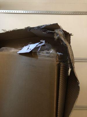 Box torn apart during shipping.