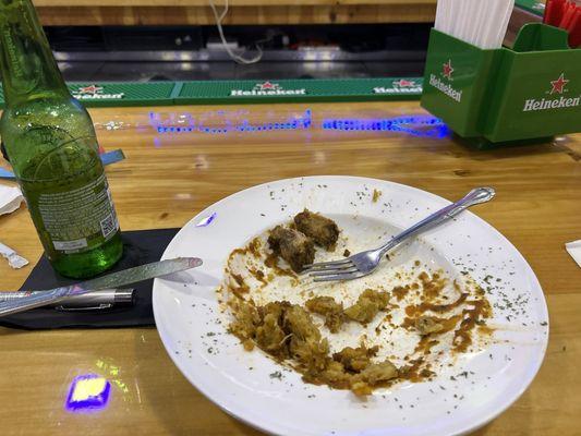 Pork mofongo, Heineken bottled beer, pen, cutlery