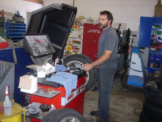 Chris checking the balance on tires.