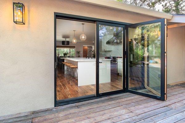 accordion door entrance into the kitchen