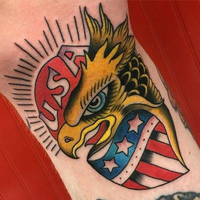 Here's a patriotic tattoo on the side of a knee done by jeremiah