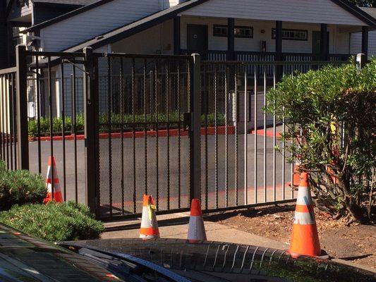 Repair to damaged aluminum fence gate.