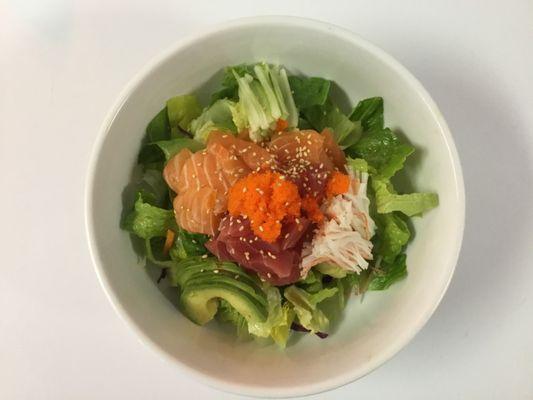 Hwe dup bap ($21.50)assorted Sashimi over mixed greens served with spicy chili sauce and rice and your choice of miso soup or house salad