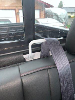 This seat belt guard just fell off while driving down the road.