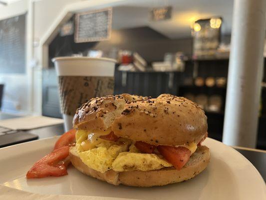 The Veggie on an everything bagel and a coffee.