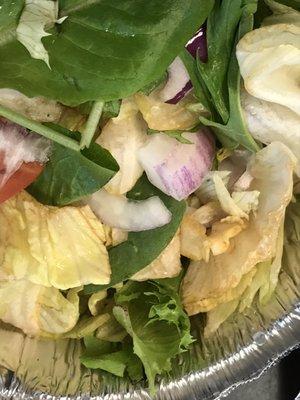 Brown lettuce in side salad