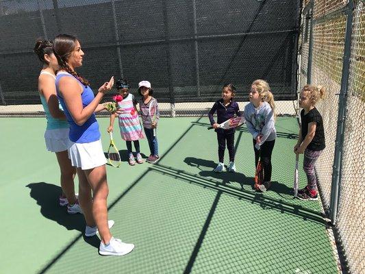 Talking tennis on the sideline