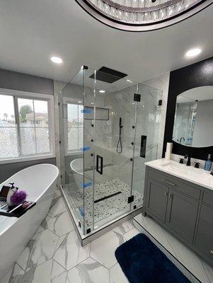 Oversized corner shower with Matte Black hardware and square handle