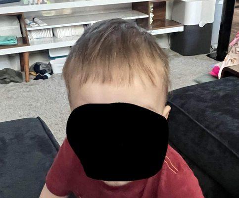 Not even his "bangs" are close to straight.