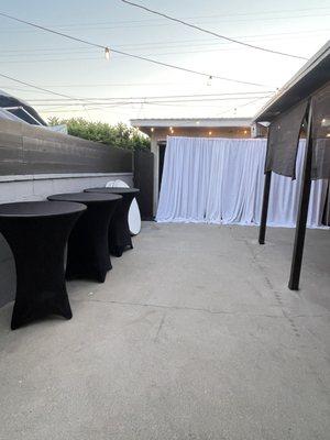 Wall draping and cocktail tables