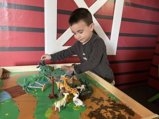 Look inside the barn for some out of the way play tables