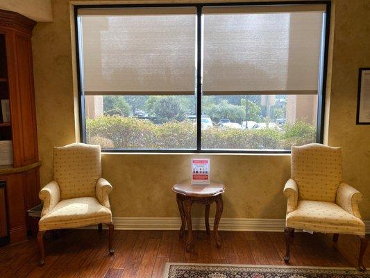 Lobby with comfy chairs to sit on.