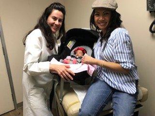 Taken with Dr. Mozayeni and our daughter Brynne Marie, 2 weeks after our successful planned C-section.