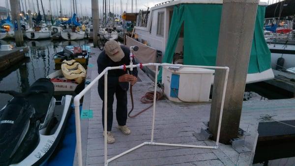 This is my father working on an outdoor shower stall. We work side by side on occation.