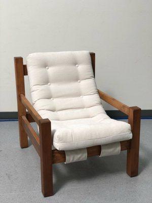 Teak mid century sling back chair.