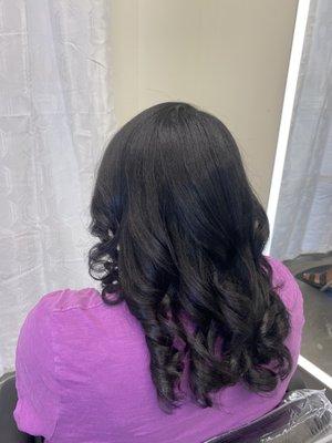 Silk press done on natural hair.