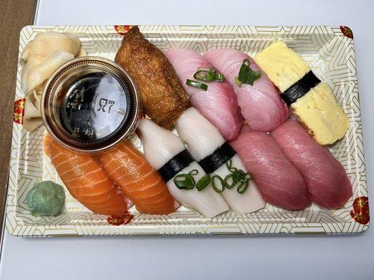 Clockwise from top left: 1 inari, 2 hamachi (yellowtail), 1 tamago (egg), 2 o-toro (fatty tuna), 2 escolar, 2 salmon. Amazing!