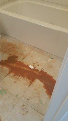 Burst pipe inside basement bathroom