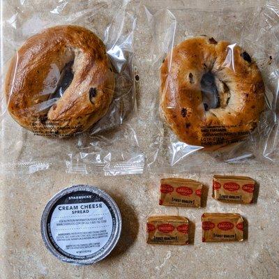 Cinnamon Raisin Bagels with plain cream cheese and butter.