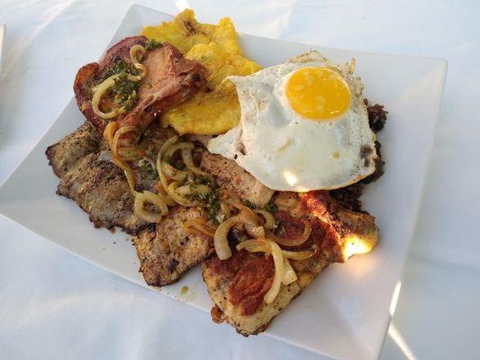 Completa cubana: chicken, pork, steak, smoke pork chop, tostones, egg, rice