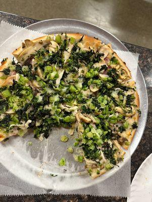 Greek pizza is so good. Added broccoli & mushrooms.