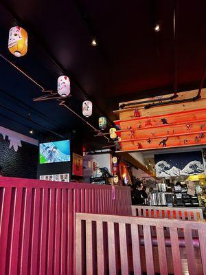 Inside - anime figurine and anime playing on the TVs