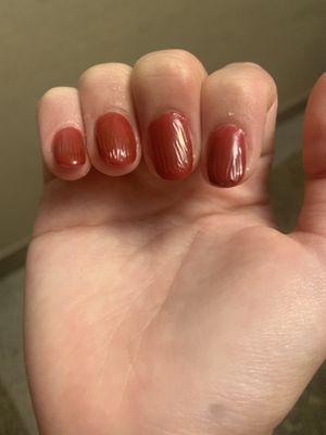 Wrinkly polish, uneven shape, dirty cuticle bed