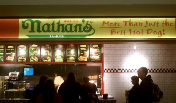 From across the airport I saw my name illuminated in bright green letters, "Nathan's". Time to eat!