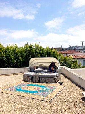 Who loves their new 5-piece couch/ottoman/table set? Add the umbrella and it's perfect for the roof deck.