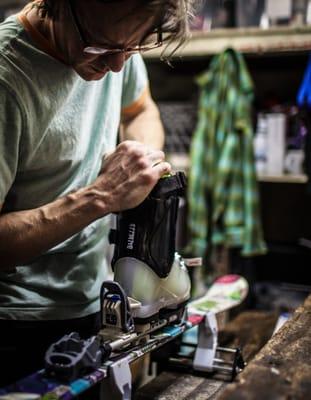 Just another day in the workshop for our ski tech, Aaron.