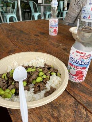 Grilled steak and edamame with lychee soda.