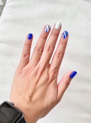 Blue and white gel design manicure