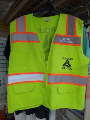 Screen printed construction vests!! Stay safe and look good! Call for embroidery!